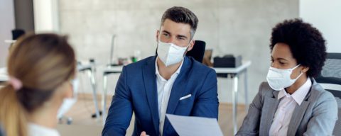 Workers wearing masks during interview 5x2