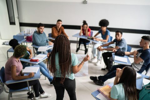 Teenager student doing a presentation in the classroom