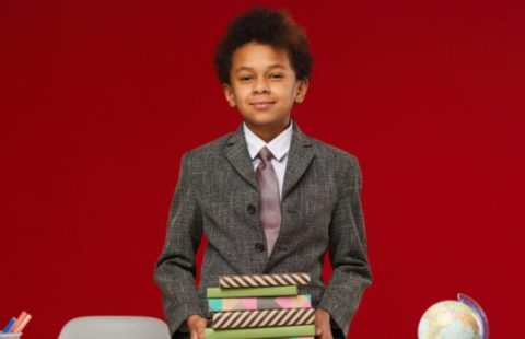 young black student holding books