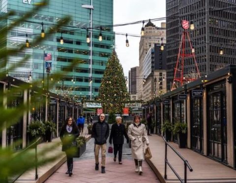 People walk through the Downtown Detroit Markets.