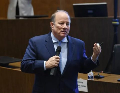 Mayor Mike Duggan discusses how Detroiters can get their share of $100M job training scholarships during community meeting on 13th floor auditorium at Coleman . Young Municipal building.