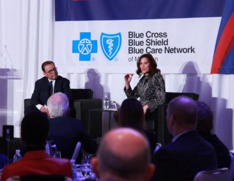Gov. Gretchen Whitmer speaks with Daniel J. Loepp at the 2023 State of the State Address to the Business Community.