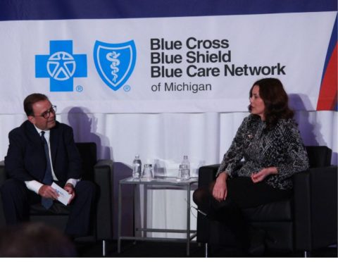 Gov. Gretchen Whitmer and Daniel J. Loepp speak during a moderated conversation at the 2023 State of the State Address to the Business Community.