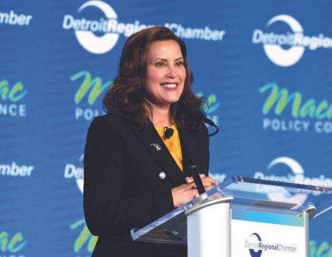 Gov. Gretchen Whitmer taking the podium at the Mackinac Policy Conference