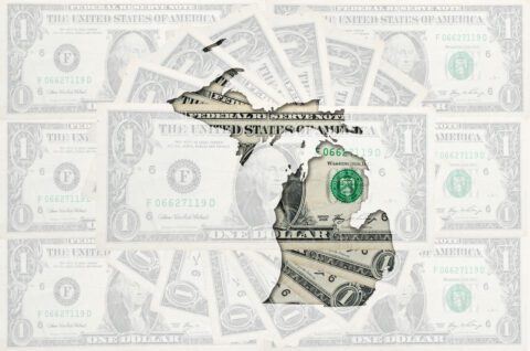 Outline map of michigan with transparent american dollar banknotes