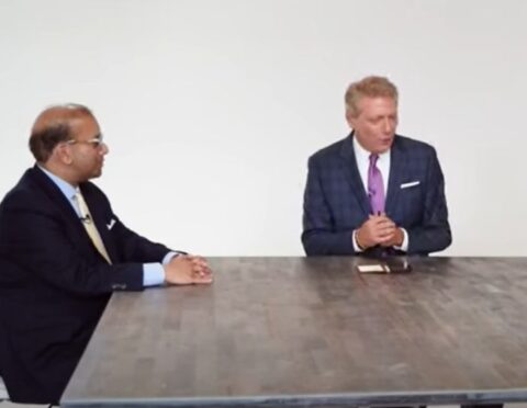 Sandy K. Baruah participating in a roundtable discussion on WDIV's Flashpoint