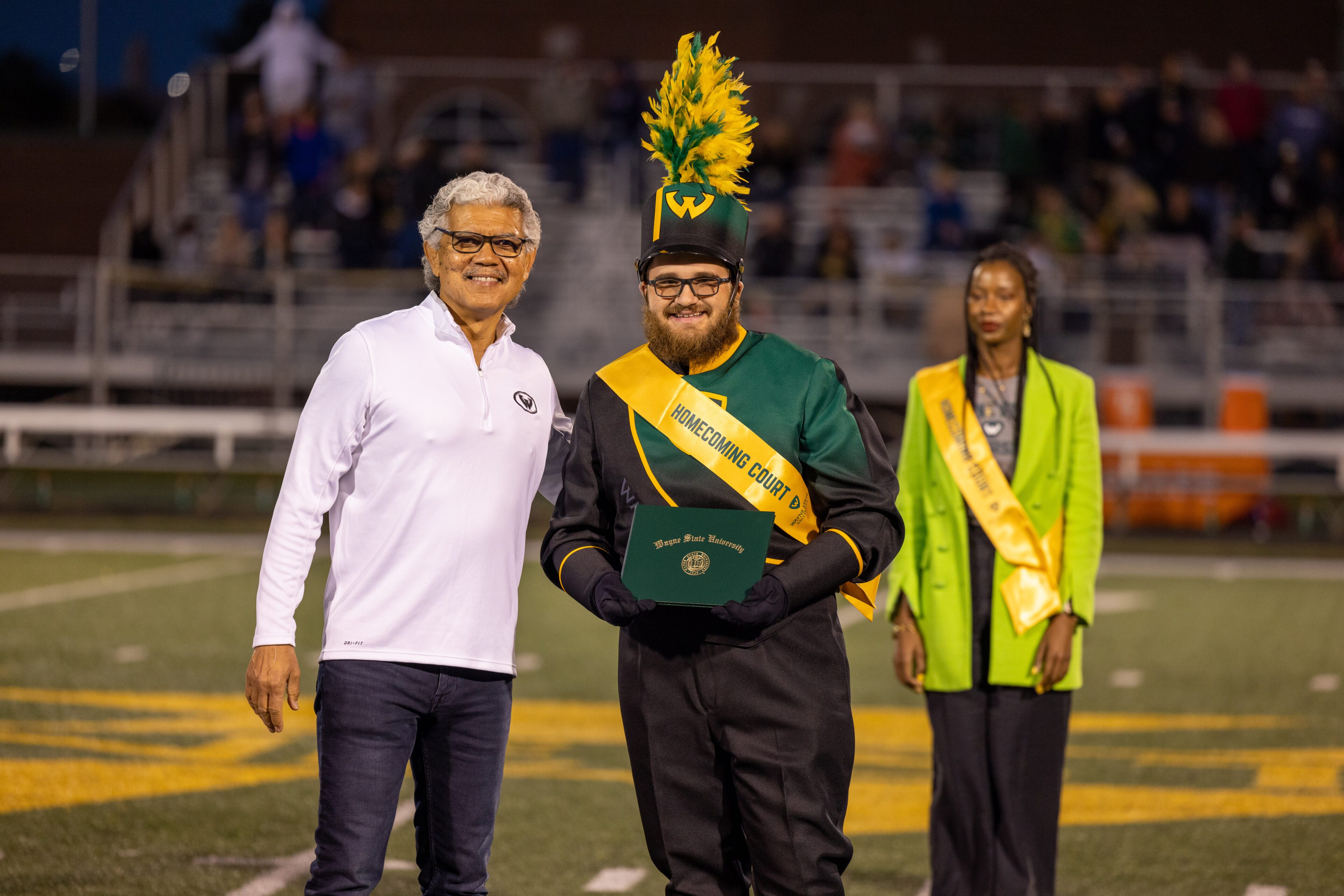 M. Roy Wilson posing with students at Wayne State University