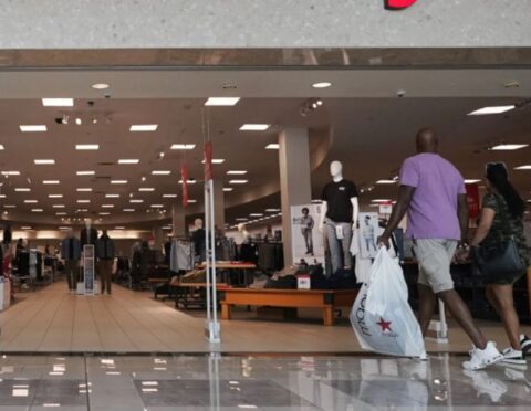 A couple approaches a JCPenney store in Frisco, Texas