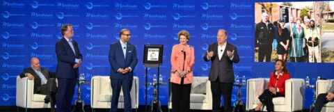 Detroit Regional Chamber President and CEO Sandy K. Baruah and Detroit Mayor Mike Duggan recognized Sen. Debbie Stabenow at the 2024 Mackinac Policy Conference.