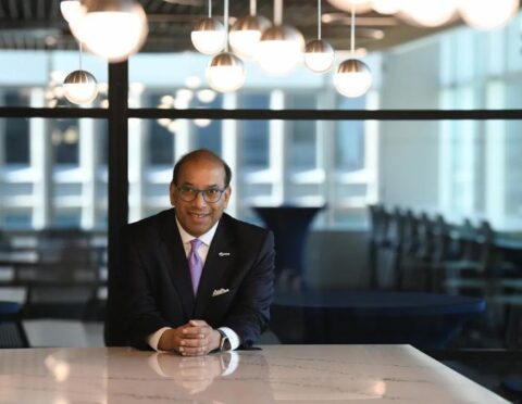 Sandy K. Baruah poses at the Detroit Regional Chamber's headquarters