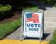 Vote here sign