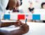 Michigan Business United For Elections - Business employee casting ballot
