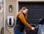 Kallie Ford using an EV charger