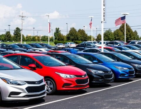 Chevrolet Automobile Dealership with American flag