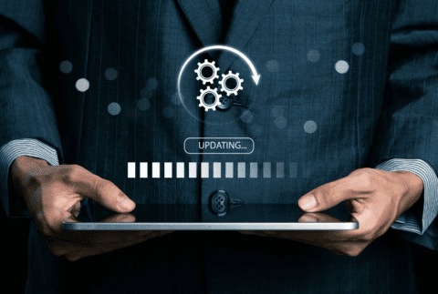 Man holding a tablet with words 