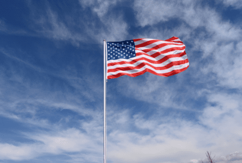 national flag of the USA fluttering in strong wind