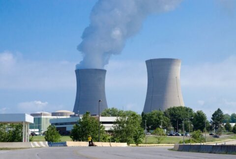Nuclear plant in Detroit with smoke out of chimney