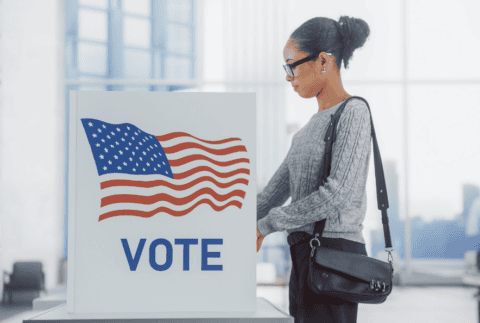 a woman voting at the polls