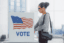 a woman voting at the polls