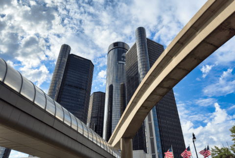 Detroit, USA - June 14, 2024: The Renaissance Center skyscrapers frame in the monorail structure in the downtown district.