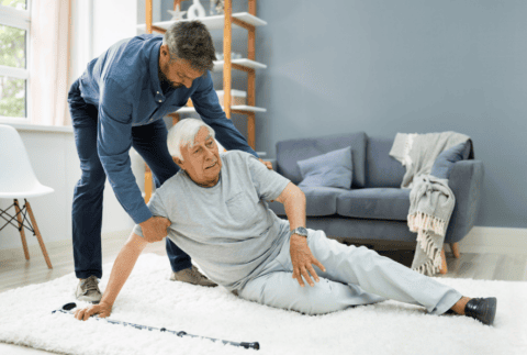 Helping Elder Senior Fallen Man After Fall Accident
