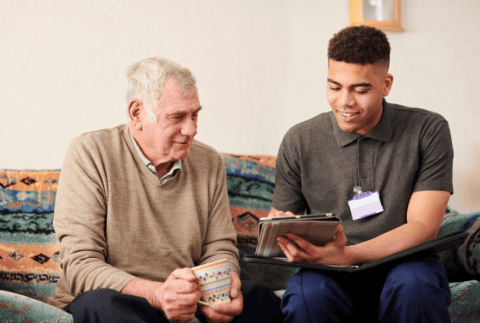 Support worker with client